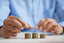 Person counting coins