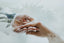 A bride and groom holding hands