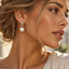 pearl, diamond drop earrings