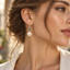 South sea Pearl and Aqua Marine  earrings in 18 K Yellow gold