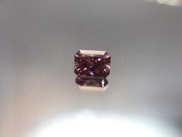 Gorgeous, bright purplish pink radiant diamond